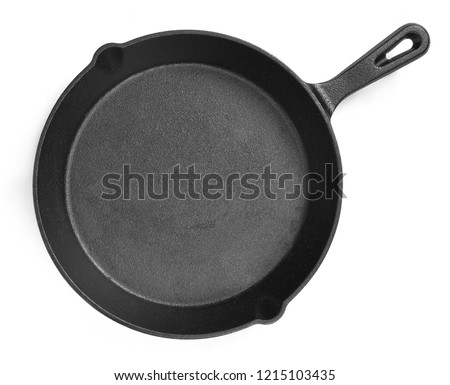 Cast iron pan with empty space, isolated on white background. Cut out object with top view or high angle view and copy space. Royalty-Free Stock Photo #1215103435