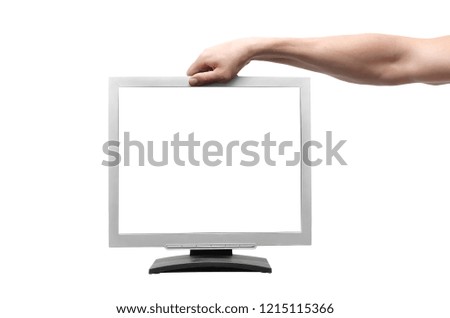TV computer monitor with blank screen in the male hand isolated on white background.