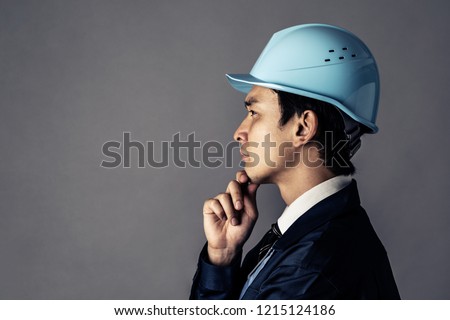 Profile of a asian engineer. Royalty-Free Stock Photo #1215124186
