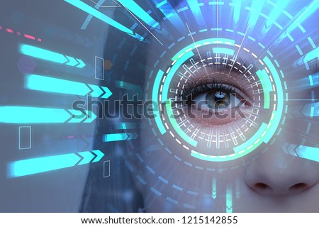 Beautiful woman eye with hud and bright blue arrows going towards it. Concept of hi tech and future. Toned image double exposure