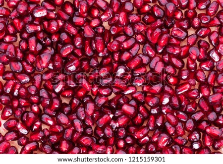Сloseup of red Pomegranate seeds, sweet and healthy.  