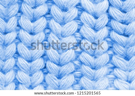 Macro of a woolen Pattern - Knitting Pattern with Purls and Knits. blue color