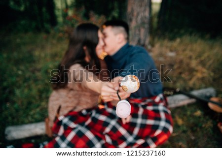 Summer Camp Fire. Couple in love. Camping fire. Love story. Romance lovers. Fashion photo.