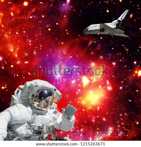 Astronaut in outer space. Shuttle on the backdrop. The elements of this image furnished by NASA.