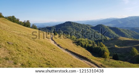 Panorama with hills in Transylvania, Romania, at sunset