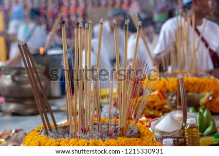 The Nine Emperor Gods Festival, The Vegetarian Festival. Burning of joss stick to worship god during the festival. Smoke from the burning incenses for worshipping. Incense sticks in a Chinese temple.