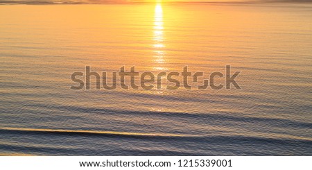 Ocean reflecting the setting sun in San Diego CA