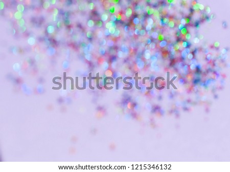 Rainbow bokeh background, small size bokeh lights and copy space for text