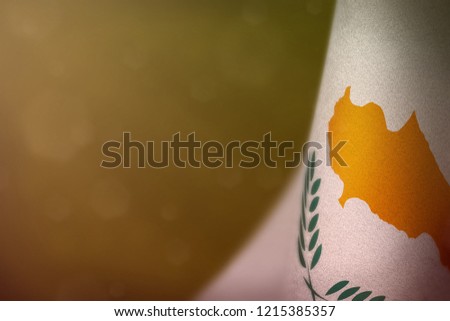 Cyprus hanging flag for honour of veterans day or memorial day on yellow dark velvet background. Cyprus glory to the heroes of war concept.