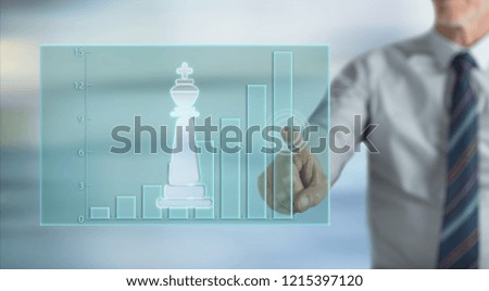 Man touching a business success strategy concept on a touch screen with his finger