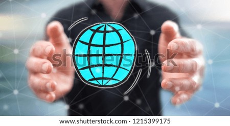 Global business concept between hands of a man in background