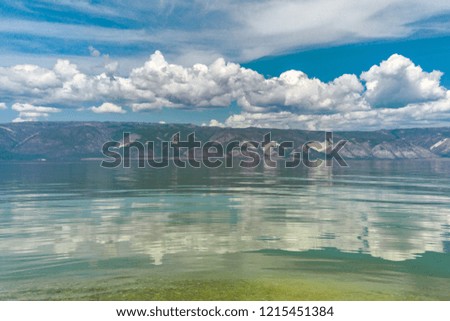 Reflection of the sky on the lake baikal in blue and turquise