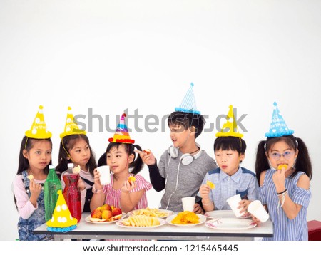 group of kids celebrate party and enjoy christmas fun together,Children eat food