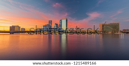 Skyline of Jacksonville, FL and Main Street Bridge at Sunset