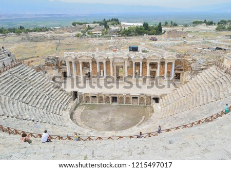 stage, orchestra pit and steps for the audience - the remains of the destroyed ancient theater in Turkey