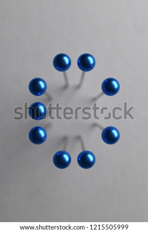 Letter C composed of blue spherical head pins. 3D rendering