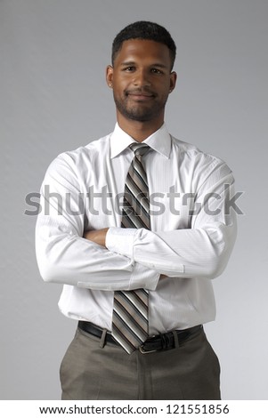 Close up image of black businessman with crossed arm