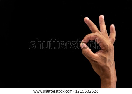 Man hand making Okay or flicking sign