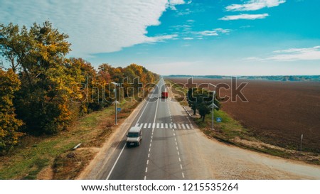 Aerial view of the new road in Ukraine. Autumn. Road marking.