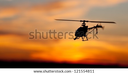 Picture of helicopter at sunset