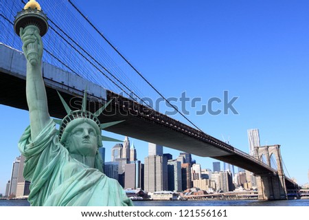 Brooklyn Bridge and The Statue of Liberty at Night, New York City