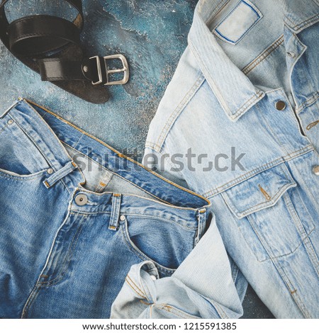 Total denim look. Blue jacket, jeans and black. Flat lay photo fashionable men's clothes. Color yea 2020, classic blue, trendy color 