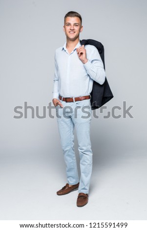 Full height of man in business clothes with jacket in hands isolated on white background