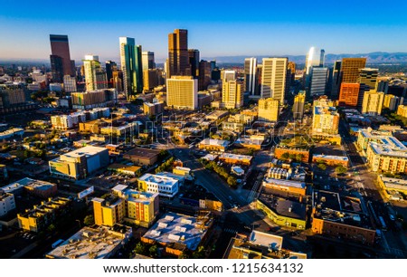 Denver Colorado Downtown Skyline Amazing Aerial drone view above the cityscape with long perspective lines at sunset