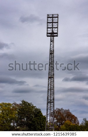 An old floodlight mast in a football stadium