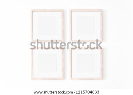Set of four square frmes with passe-partout. Wooden frame mockup on white wall. Poster mockup. Clean, modern, minimal frame. Empty fra.me Indoor interior, show text or product