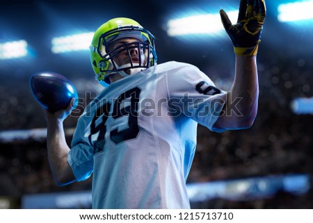 American football sportsman player on stadium in action. Sport wallpaper or advertising