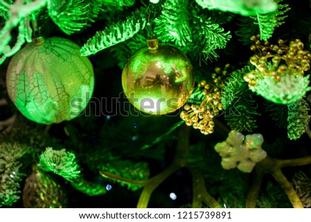 Christmas / new year decorations hanging on the Christmas tree. Christmas decorations - balls, stars, keys hang on the Christmas tree. new year 2019. new 2019