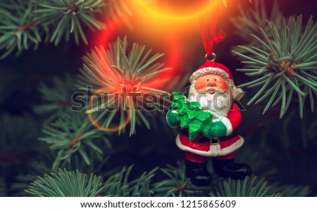 New Year and Christmas happy Santa Claus at sunset, fabulous picture with a Christmas tree.