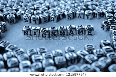 Nickname - Word from Metal Blocks on Paper - Concept Photo on Table
 Royalty-Free Stock Photo #1215899347