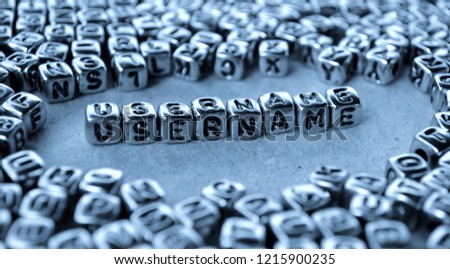 Username - Word from Metal Blocks on Paper - Concept Photo on Table
