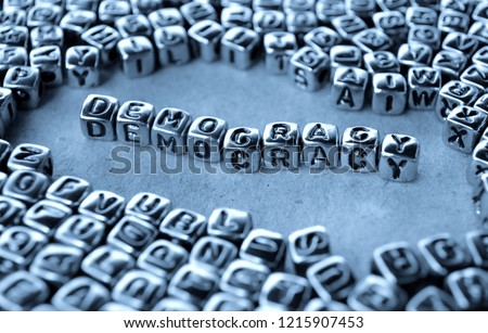 Democracy - Word from Metal Blocks on Paper - Concept Photo on Table
 Royalty-Free Stock Photo #1215907453