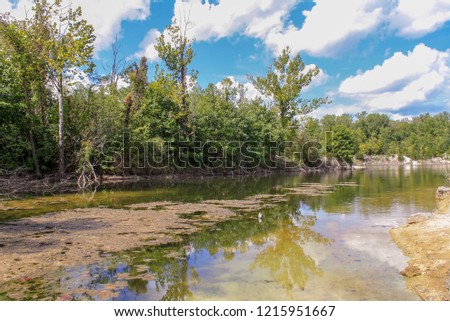 Colorful photo of sky reflecting of the lake at Klondike Park in Augusta Missouri 
