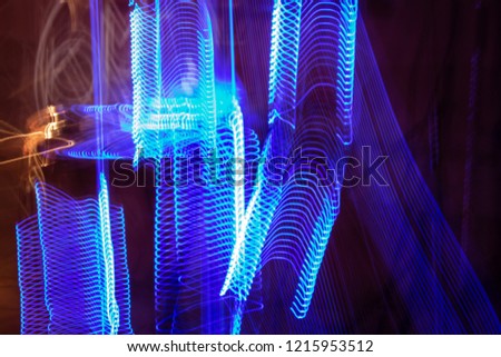 Light painting, Series of photos created using the technique of painting with light, using a photographic machine in hand for abstract effect