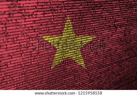 Vietnam flag  is depicted on the screen with the program code. The concept of modern technology and site development
