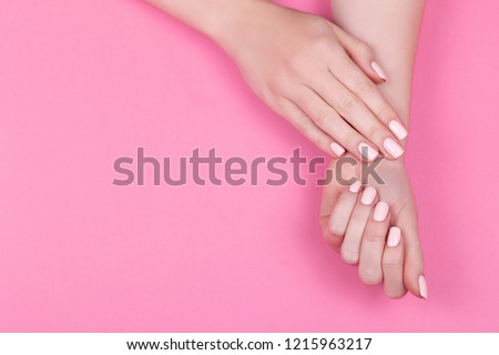 Stylish trendy female pink manicure. Royalty-Free Stock Photo #1215963217