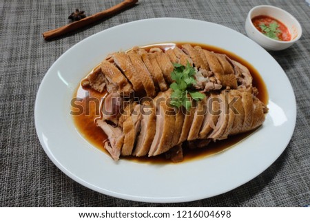 Steamed duck Thai cuisine in dish on white.street food Thailand or food chinese