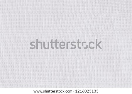 White cotton background. Surface of fabric texture in snow white winter color.

