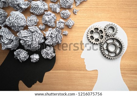 Mental health image. Silhouette of depressed person brain and healthy person brain. 
Waste paper, gears and head silhouette. 
 Royalty-Free Stock Photo #1216075756