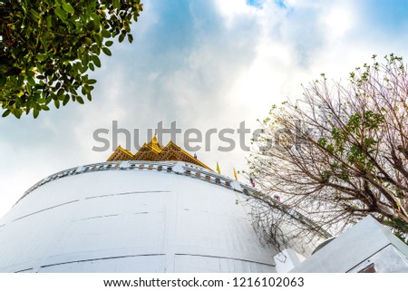 Lookup View Beautiful Temple At Wat Saket Ratcha Wora Maha Wihan Or Temple of The Golden Mount With Sky Clouds In Bangkok City, Thailand  