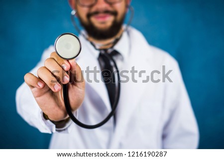 Cheerful doctor with a stethoscope close up