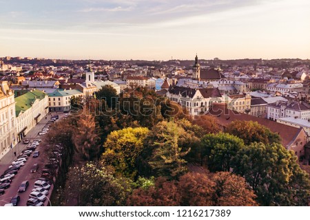 aerial view of sunset above european city in autumn