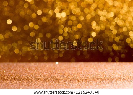 gold glitter vintage lights bokeh abstract background. defocused