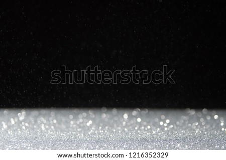 Abstract of christmas and bokeh light with glitter background .
