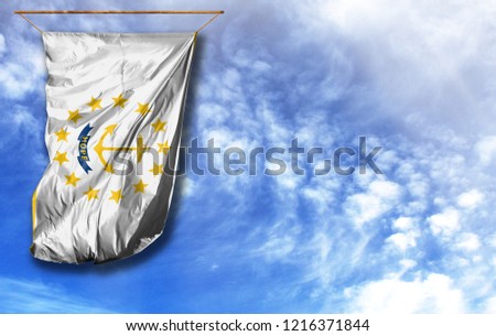 Flag State of Rhode Island and Providence Plantations. Vertical flag, against blue sky with place for your text