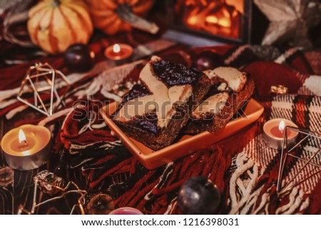 Food photo. Fruit cake. Romantic dinner. Halloween, pumpkins. Evening light